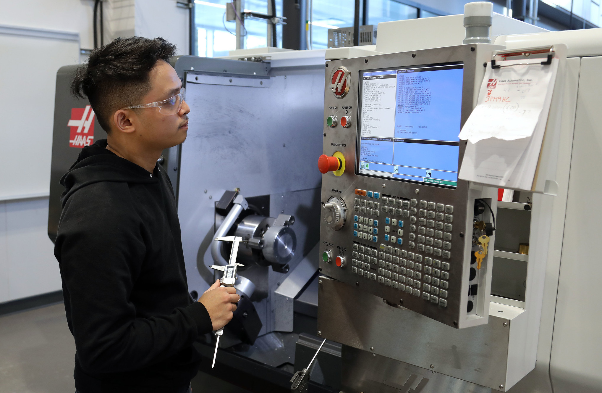 Student learning CNC machining
